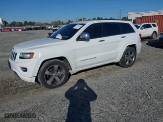 2014 Jeep Grand Cherokee Overland with VIN 1C4RJFCG9EC587322, listed as a IAAI auction lot 41632299 with 161,779 mi miles. Bid and sale history available at carsss.com. Image 17.