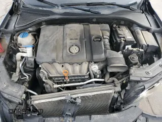 2013 Volkswagen Passat SE z VIN 1VWBH7A38DC021974, wystawiony jako Copart lot #50365355 z przebiegiem 127 888 mil mil oraz Szkoda całkowita • Salvage title. Historia ofert i sprzedaży dostępna na DreamBid. Obrazek 11.