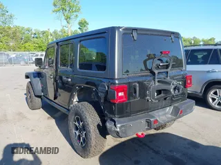 2022 Jeep Wrangler Unlimited Rubicon with VIN 1C4HJXFNXNW149063, listed as a IAAI auction lot 42130171 with 33,961 mi miles and . Bid and sale history available at DreamBid. Image 3.