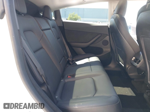2023 Tesla Model Y Long Range with VIN 7SAYGDEE2PF696336, listed as a IAAI auction lot 41894686 with 34,203 mi miles. Bid and sale history available at carsss.com. Image 8.