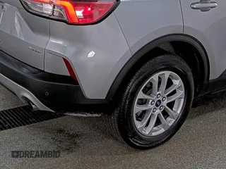 2022 Ford Escape SE with VIN 1FMCU9G65NUB32764, listed as a IAAI auction lot 42806882 with 81,565 mi miles and . Bid and sale history available at DreamBid. Image 35.