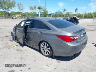 2013 Hyundai Sonata Limited with VIN 5NPEC4AC6DH684767, listed as a IAAI auction lot 41860059 with 76,233 mi miles and . Bid and sale history available at DreamBid. Image 3.