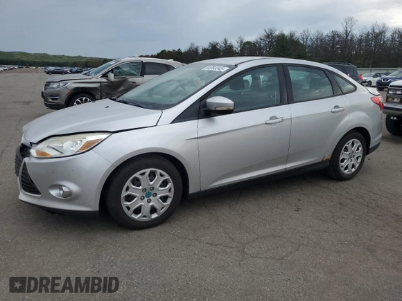 2012 Ford Focus SE with VIN 1FAHP3F2XCL202510, listed as a Copart auction lot 64066545 with 77,828 mi miles and Salvage title. Bid and sale history available at DreamBid. Image 1.