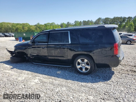 2018 Chevrolet Suburban Premier with VIN 1GNSCJKC1JR199271, listed as a Copart auction lot 52395935 with 216,083 mi miles and Salvage Title. Bid and sale history available at DreamBid. Image 2.