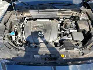 2018 Mazda CX-5 Grand Touring with VIN JM3KFADM5J0325794, listed as a Copart auction lot 79748544 with 106,781 mi miles and Salvage Title. Bid and sale history available at carsss.com. Image 12.