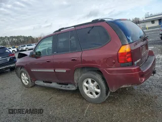 2003 GMC Envoy SLT with VIN 1GKDT13S032245485, listed as a Copart auction lot 84385304 with 139,183 mi miles and Salvage Title. Bid and sale history available at carsss.com. Image 2.