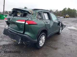 2023 Toyota Corolla Cross LE z VIN 7MUCAABG8PV044965, wystawiony jako IAAI lot #41915223 z przebiegiem 61 222 mil mil oraz . Historia ofert i sprzedaży dostępna na DreamBid. Obrazek 4.