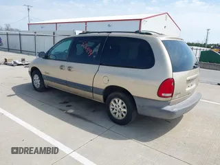1999 Plymouth Voyager Grand SE z VIN 1P4GP44G0XB613853, wystawiony jako IAAI lot #42064199 z przebiegiem 175 050 mil mil oraz . Historia ofert i sprzedaży dostępna na DreamBid. Obrazek 3.