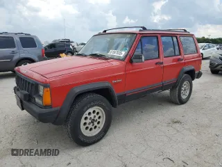 1994 Jeep Cherokee Sport z VIN 1J4FJ68S2RL214431, wystawiony jako Copart lot #61567835 z przebiegiem 168 716 mil mil oraz Szkoda całkowita • Salvage title. Historia ofert i sprzedaży dostępna na DreamBid. Obrazek 1.