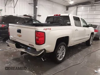 2014 Chevrolet Silverado 1500 High Country with VIN 3GCUKTEC4EG527722, listed as a IAAI auction lot 41978841 with 104,492 mi miles and . Bid and sale history available at DreamBid. Image 4.