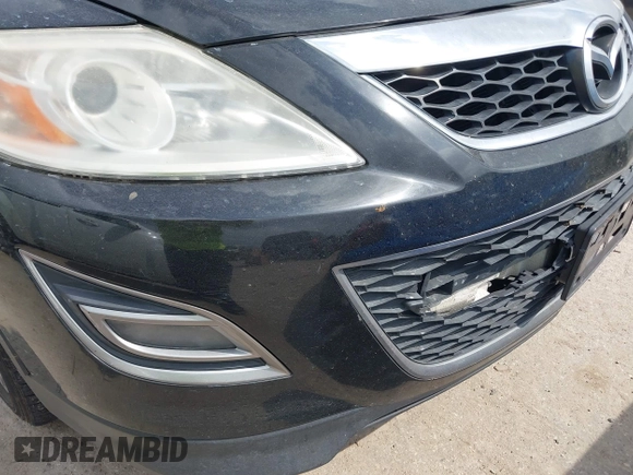 2011 Mazda CX-9 Grand Touring with VIN JM3TB2DA7B0304023, listed as a IAAI auction lot 41950829 with 135,858 mi miles. Bid and sale history available at carsss.com. Image 12.