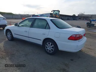 1999 Honda Accord LX with VIN JHMCG665XXC014090, listed as a IAAI auction lot 41765749 with 231,682 mi miles and . Bid and sale history available at DreamBid. Image 3.