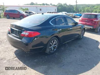 2012 Infiniti M with VIN JN1BY1AP3CM330962, listed as a IAAI auction lot 42130578 with 235,278 mi miles and . Bid and sale history available at DreamBid. Image 4.