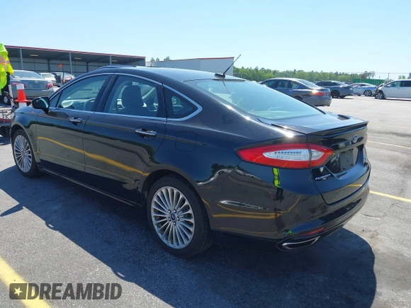 2016 Ford Fusion Titanium with VIN 3FA6P0K9XGR158234, listed as a IAAI auction lot 42043716 with 161,164 mi miles. Bid and sale history available at carsss.com. Image 3.