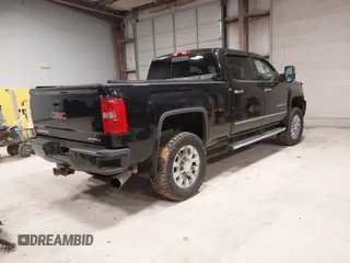 2015 GMC Sierra 2500HD available WiFi Denali with VIN 1GT120E89FF117773, listed as a IAAI auction lot 41587823 with 251,371 mi miles. Bid and sale history available at carsss.com. Image 4.
