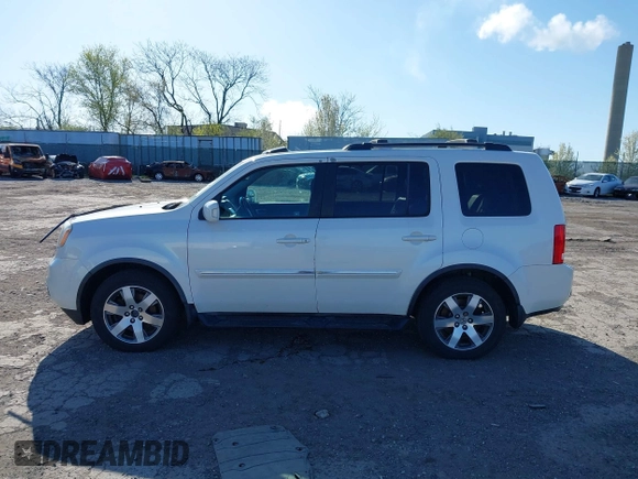 2012 Honda Pilot Touring with VIN 5FNYF4H98CB057659, listed as a IAAI auction lot 41927990 with 140,000 mi miles. Bid and sale history available at carsss.com. Image 14.