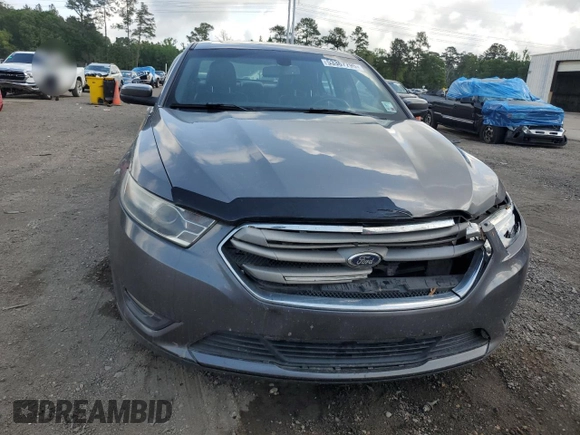 2014 Ford Taurus SEL with VIN 1FAHP2E84EG123006, listed as a Copart auction lot 53367795 with 216,092 mi miles and Salvage Title. Bid and sale history available at carsss.com. Image 5.