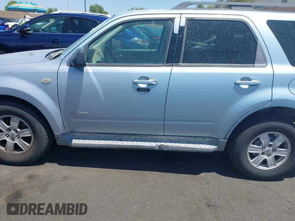 2008 Mercury Mariner with VIN 4M2CU81198KJ06044, listed as a IAAI auction lot 42466023 with 165,545 mi miles and . Bid and sale history available at DreamBid. Image 14.