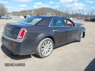 2012 Chrysler 300 C Luxury Series with VIN 2C3CCAPT3CH253909, listed as a IAAI auction lot 41990734 with 95,881 mi miles and . Bid and sale history available at carsss.com. Image 4.