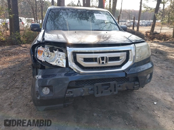 2009 Honda Pilot Touring with VIN 5FNYF48939B007471, listed as a IAAI auction lot 41683495 with 189,806 mi miles and . Bid and sale history available at carsss.com. Image 6.