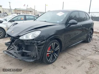 2014 Porsche Cayenne Turbo with VIN WP1AC2A20ELA87829, listed as a IAAI auction lot 41567407 with 94,777 mi miles. Bid and sale history available at carsss.com. Image 16.