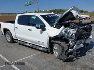 2022 GMC Sierra 1500 SLT with VIN 3GTU9DED3NG156904, listed as a IAAI auction lot 42429722 with 59,717 mi miles and . Bid and sale history available at DreamBid. Image 1.