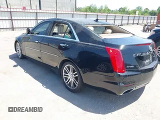 2014 Cadillac CTS Luxury RWD with VIN 1G6AR5SX4E0195791, listed as a IAAI auction lot 42004960 with Not Provided miles. Bid and sale history available at carsss.com. Image 3.