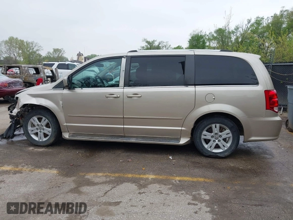2013 Dodge Grand Caravan Crew with VIN 2C4RDGDG7DR624563, listed as a IAAI auction lot 42038157 with 265,044 mi miles and . Bid and sale history available at DreamBid. Image 14.