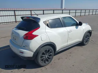 2014 Nissan Juke SL with VIN JN8AF5MV3ET358838, listed as a IAAI auction lot 41904916 with 86,273 mi miles. Bid and sale history available at carsss.com. Image 4.