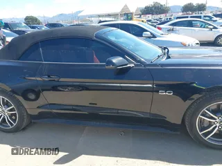 2015 Ford Mustang GT Premium z VIN 1FATP8FFXF5413662, wystawiony jako IAAI lot #41921692 z przebiegiem 62 667 mil mil oraz . Historia ofert i sprzedaży dostępna na DreamBid. Obrazek 14.