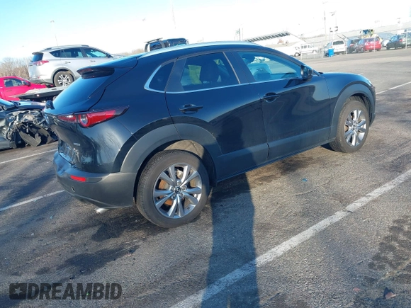 2023 Mazda CX-30 2.5 S Select Package with VIN 3MVDMBBM3PM584854, listed as a IAAI auction lot 41736925 with 39,008 mi miles. Bid and sale history available at carsss.com. Image 4.