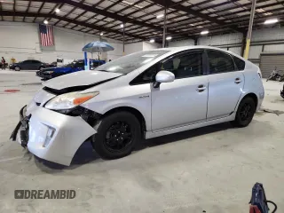 2012 Toyota Prius One with VIN JTDKN3DU6C5393955, listed as a Copart auction lot 63623415 with 144,869 mi miles and Salvage title. Bid and sale history available at DreamBid. Image 1.
