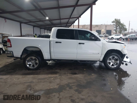 2023 Ram 1500 Big Horn z VIN 1C6RRFFG7PN698664, wystawiony jako IAAI lot #41103495 z przebiegiem 34 307 mil mil oraz . Historia ofert i sprzedaży dostępna na DreamBid. Obrazek 14.