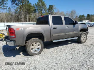 2013 GMC Sierra 1500 SLT with VIN 3GTP2WE71DG236708, listed as a Copart auction lot 50181885 with 205,620 mi miles and Salvage title. Bid and sale history available at DreamBid. Image 3.