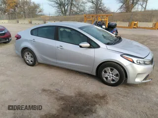 2018 Kia Forte LX with VIN 3KPFK4A79JE210080, listed as a IAAI auction lot 40681931 with 124,986 mi miles and . Bid and sale history available at DreamBid. Image 1.