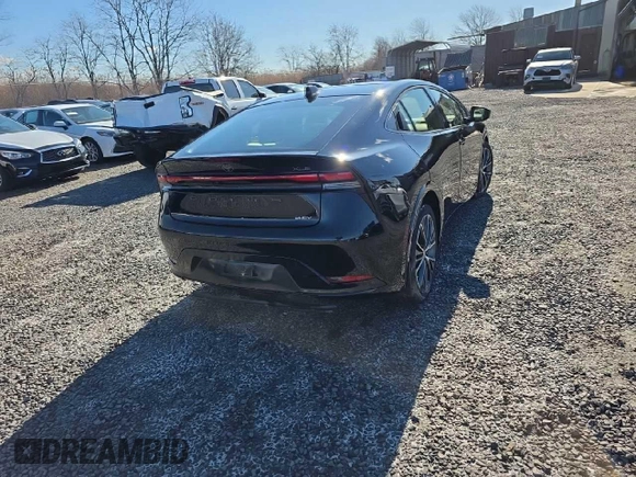 2023 Toyota Prius LE z VIN JTDADABU7P3002593, wystawiony jako Copart lot #48176675 z przebiegiem 10 726 mil mil oraz Szkoda całkowita • Salvage title. Historia ofert i sprzedaży dostępna na DreamBid. Obrazek 4.