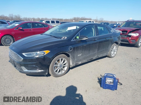 2018 Ford Fusion Energi SE with VIN 3FA6P0PU8JR152890, listed as a IAAI auction lot 41682965 with 84,890 mi miles. Bid and sale history available at carsss.com. Image 2.