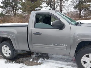 2012 Chevrolet Silverado 1500 LT with VIN 1GCNKSE07CZ300090, listed as a IAAI auction lot 41329121 with 125,658 mi miles. Bid and sale history available at carsss.com. Image 13.