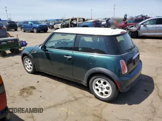 2006 MINI Hardtop with VIN WMWRC33546TK15957, listed as a Copart auction lot 54660995 with 100,893 mi miles and Clean Title. Bid and sale history available at DreamBid. Image 2.