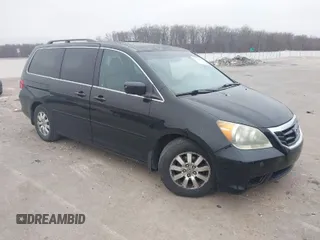 2010 Honda Odyssey EX-L with VIN 5FNRL3H73AB078714, listed as a IAAI auction lot 41520151 with 218,466 mi miles. Bid and sale history available at carsss.com. Image 1.