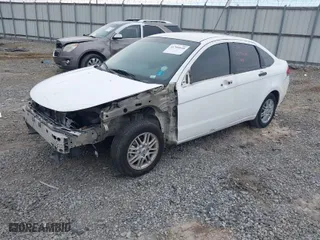 2009 Ford Focus SE with VIN 1FAHP35NX9W141890, listed as a IAAI auction lot 41709648 with 174,372 mi miles. Bid and sale history available at carsss.com. Image 2.