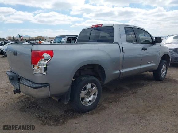 2010 Toyota Tundra 2WD Truck with VIN 5TFRM5F12AX011275, listed as a IAAI auction lot 41871927 with 252,014 mi miles. Bid and sale history available at carsss.com. Image 4.