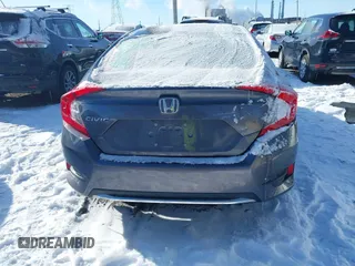 2020 Honda Civic LX z VIN 2HGFC2F64LH580766, wystawiony jako IAAI lot #41597161 z przebiegiem 10 828 mil mil oraz . Historia ofert i sprzedaży dostępna na DreamBid. Obrazek 17.