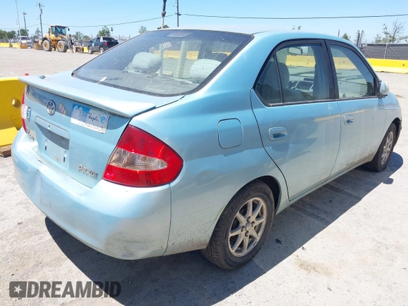 2003 Toyota Prius z VIN JT2BK12U130071262, wystawiony jako IAAI lot #42333933 z przebiegiem 314 553 mil mil oraz . Historia ofert i sprzedaży dostępna na DreamBid. Obrazek 4.