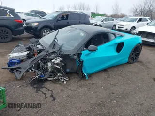 2023 McLaren Artura z VIN SBM16AEA2PW001787, wystawiony jako IAAI lot #41842771 z przebiegiem 2352 mil mil oraz . Historia ofert i sprzedaży dostępna na DreamBid. Obrazek 2.