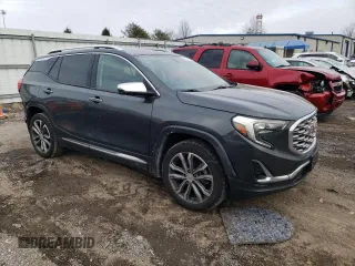 2019 GMC Terrain Denali with VIN 3GKALXEX1KL390529, listed as a Copart auction lot 45210115 with 124,497 mi miles and Salvage Title. Bid and sale history available at carsss.com. Image 4.