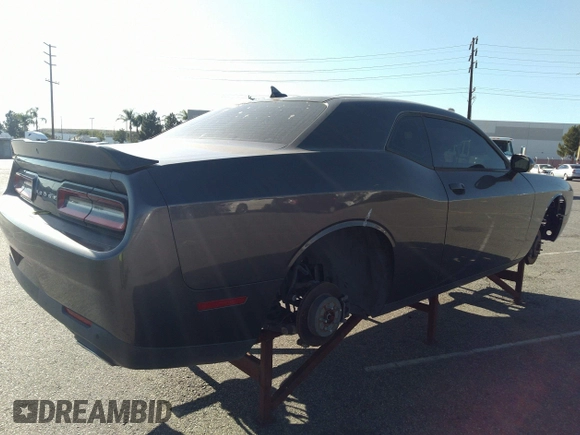 2016 Dodge Challenger SXT with VIN 2C3CDZAG7GH113956, listed as a IAAI auction lot 35633634 with Not provided miles and . Bid and sale history available at DreamBid. Image 4.