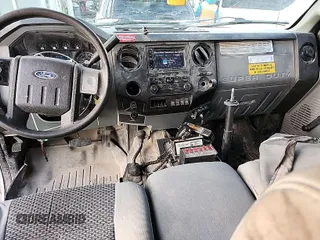 2015 Ford Super Duty F-250 SRW XLT with VIN 1FT7X2B66FEA60254, listed as a IAAI auction lot 42025477 with 297,432 mi miles. Bid and sale history available at carsss.com. Image 1.