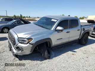 2023 Toyota Tacoma SR with VIN 3TMCZ5AN8PM545588, listed as a Copart auction lot 57528655 with 73,286 mi miles and Salvage title. Bid and sale history available at DreamBid. Image 1.