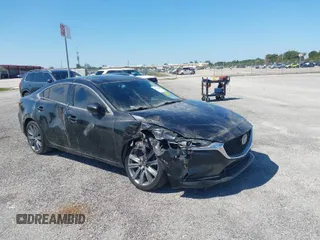 2020 Mazda 6 Touring with VIN JM1GL1VMXL1517828, listed as a IAAI auction lot 41511804 with 123,174 mi miles. Bid and sale history available at carsss.com. Image 1.